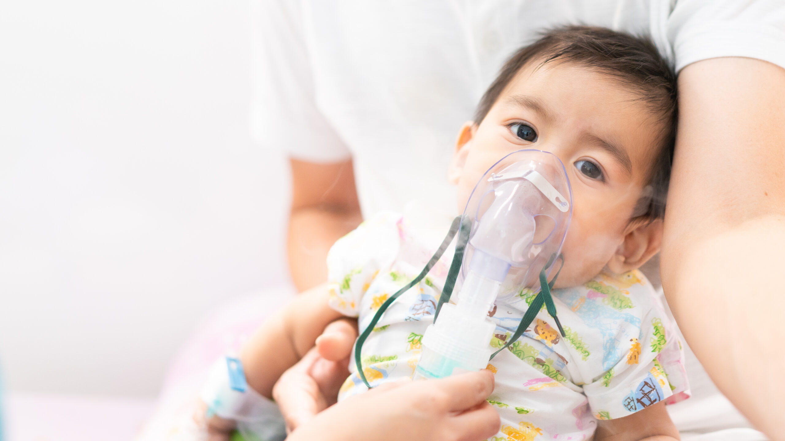 Small child receiving pediatric respiratory care